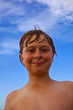 smiling happy boy at the beach