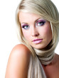 Blond woman with long straight hairs and bright pink make-up