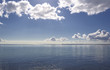 An early morning photo of young people kayaking on the ocean