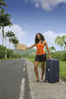 Auto stopeuse avec une grosse valise Auto stopeuse avec une grosse valise