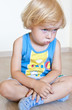 Boy with sulky look