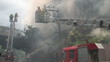 Firefighters battle blaze on Bangkok street, 2010