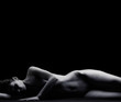 Beautiful silhuette of a young naked woman