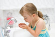 little girl in bathroom