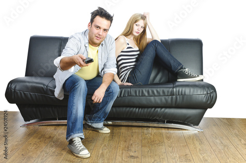Foto: Teenagerpärchen auf dem Sofa hat Stess Teenagerpärchen auf dem Sofa hat Stess