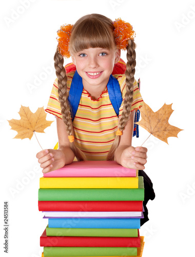 Photo: Girl holding pile of books. Girl holding pile of books.