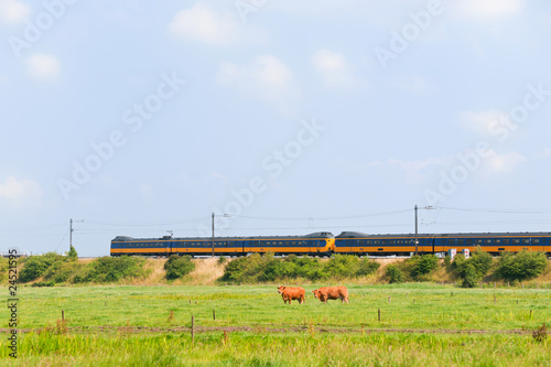 Photo: Dutch train in landscape Dutch train in landscape