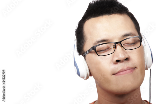 Photo: young man listen and enjoy the music young man listen and enjoy the music