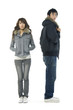 young casual couple portrait in white background