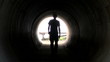 Man in tunnel walks into the light - Hd