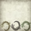 textured old paper background with tribal iguanas pattern