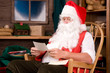 Photo: Santa Claus in Workshop With Letters Santa Claus in Workshop With Letters