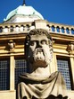 Grotesque stone head, Sheldonian Theatre, Oxford, united kingdom Grotesque stone head, Sheldonian Theatre, Oxford, united kingdom