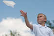 Boy with paper plane