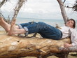 sieste d'un robinson sur la plage