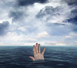 Hand in ocean
