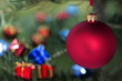 Red glass ball and Christmas evergreen tree