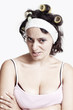 Photo: Angry evil housewife with curlers in her hair Angry evil housewife with curlers in her hair