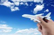 Hand holding model plane. Hand holding model plane.