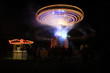 Spinning carousel at night Spinning carousel at night