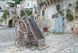 Wooden hand-cart with bicycle.