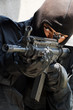 Soldier in black uniform with rifle Soldier in black uniform with rifle