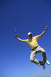 GOLF - jumping golfer with deep blue sky