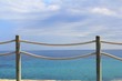 banister railing on marine rope and wood