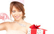 teenage party girl with magic wand and gift box
