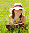 girl reading in meadow