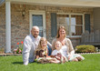 Family in Front of Their Home Family in Front of Their Home