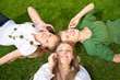 girls talking on mobile in the park girls talking on mobile in the park