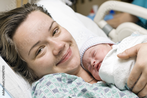 Photo: Happy mother with newborn baby Happy mother with newborn baby