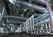Equipment, cables and piping as found inside of a modern industr