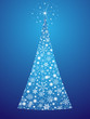 Christmas tree made from snowflakes on a blue background Christmas tree made from snowflakes on a blue background