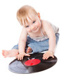 The small child with a black gramophone record