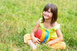 Photo: The child sits on a grass The child sits on a grass