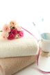 Roses on towel and tooth brush