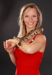 woman holding a snake woman holding a snake