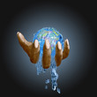 Globe encased in Water with Human Hand