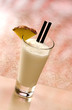 Linda Pina Colada Cocktail with a piece of pineapple Linda Pina Colada Cocktail with a piece of pineapple