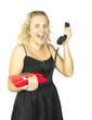 Blonde woman  with a red retro phone