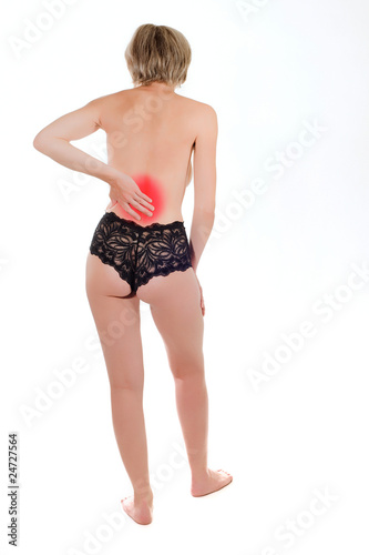Photo: Woman With Back Pain Woman With Back Pain