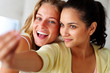 Self photography - Excited girls taking picture of themselves