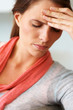 Closeup of a cute young woman looking frustrated
