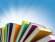 colored books isolated on blue