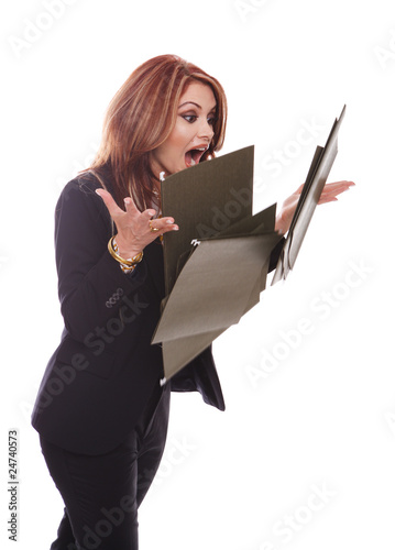Photo: Businesswoman dropping files Businesswoman dropping files