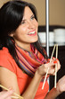 Woman and chopsticks