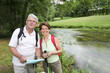 Senior couple on a walk by riverside