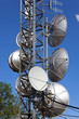 communications dishes with blue sky